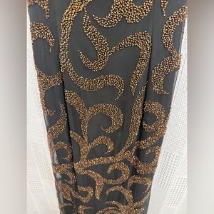Stunning beaded formal. Black w copper/bronze colored beading. Backless